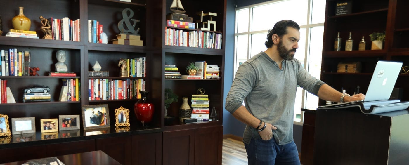 Founder of Fit Body Boot Camp, Bedros Keuilian, in his office working