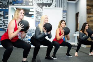 group fitness workout with women at fit body boot camp